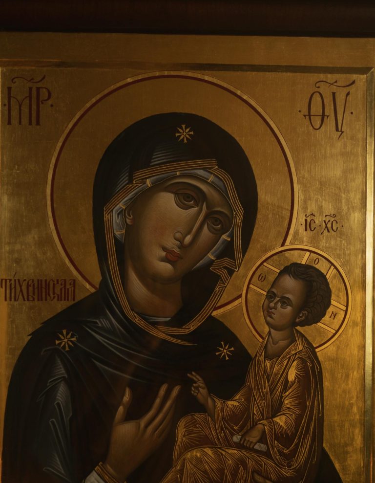 Traditional religious icon depicting the Virgin Mary and Child Jesus in vibrant religious art style.